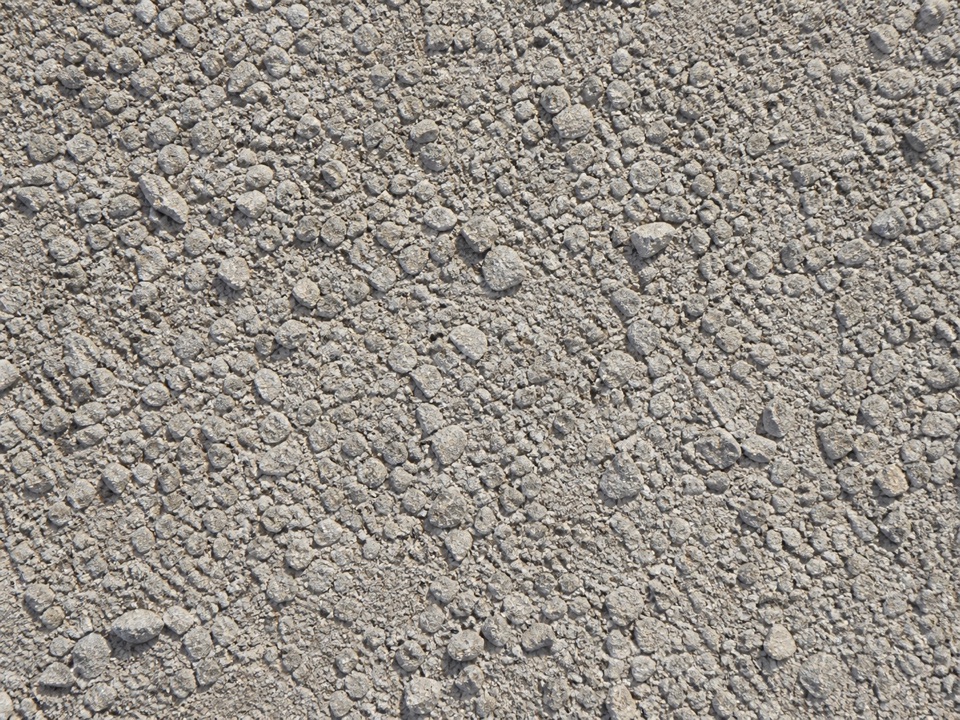 Close-up of crushed stone and fines for compacted base