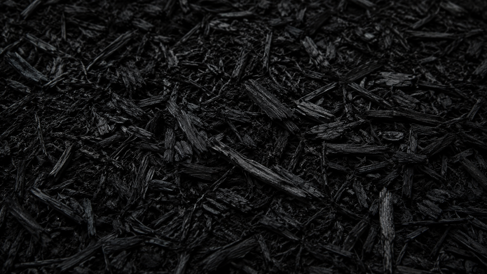 Black dyed mulch texture